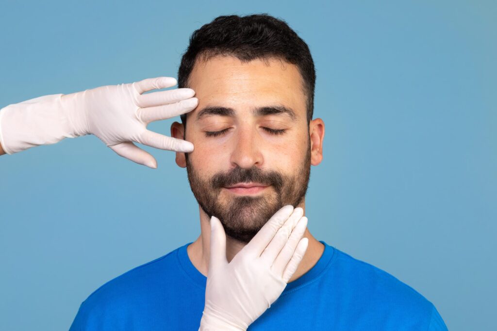 A patient having a consultation for a male facelift in Newport Beach, California at Dr. George Brennan's clinic