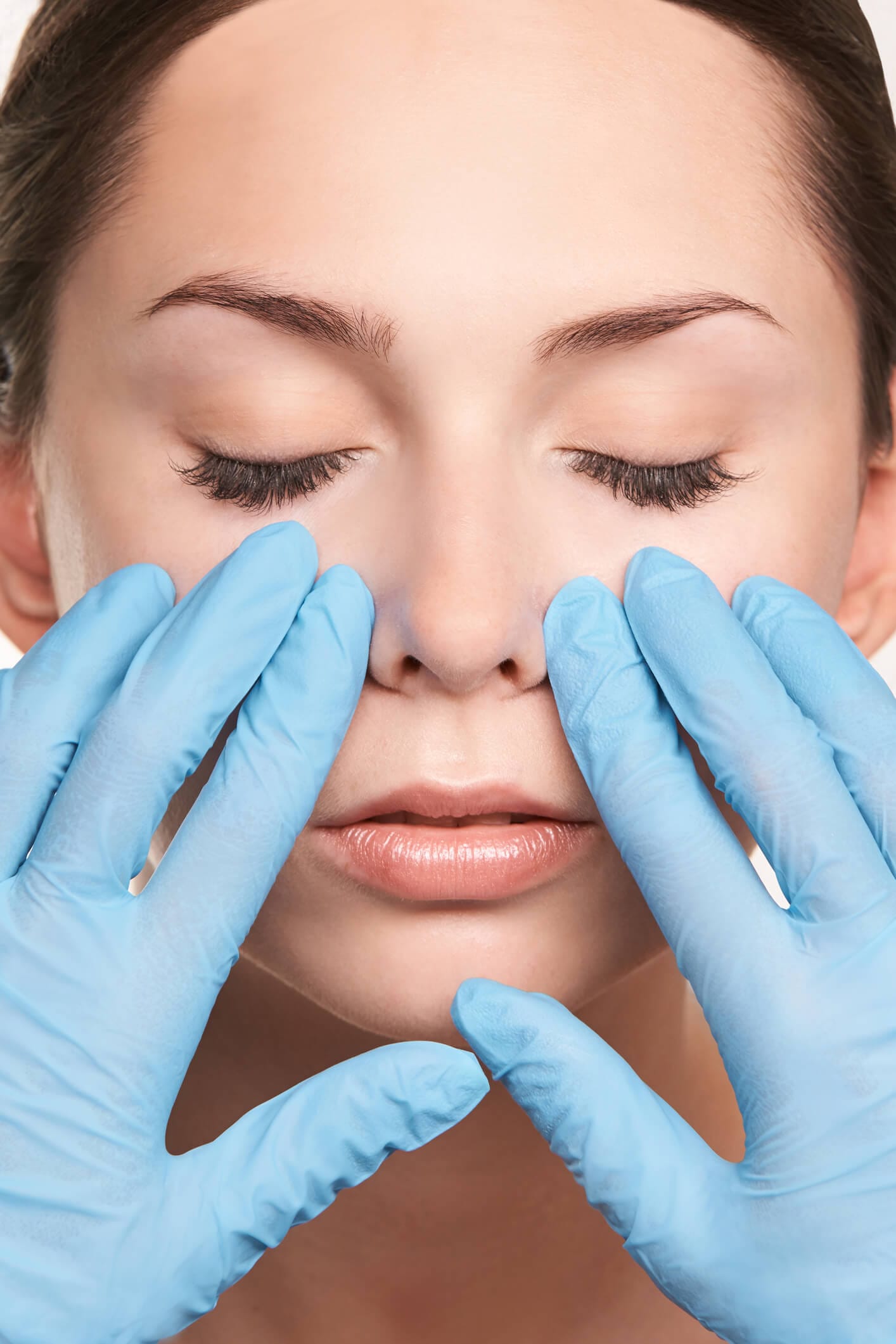 Patient having a rhinoplasty preparation of rhinoplasty in Newport Beach, California at Dr. George Brennan's Clinic