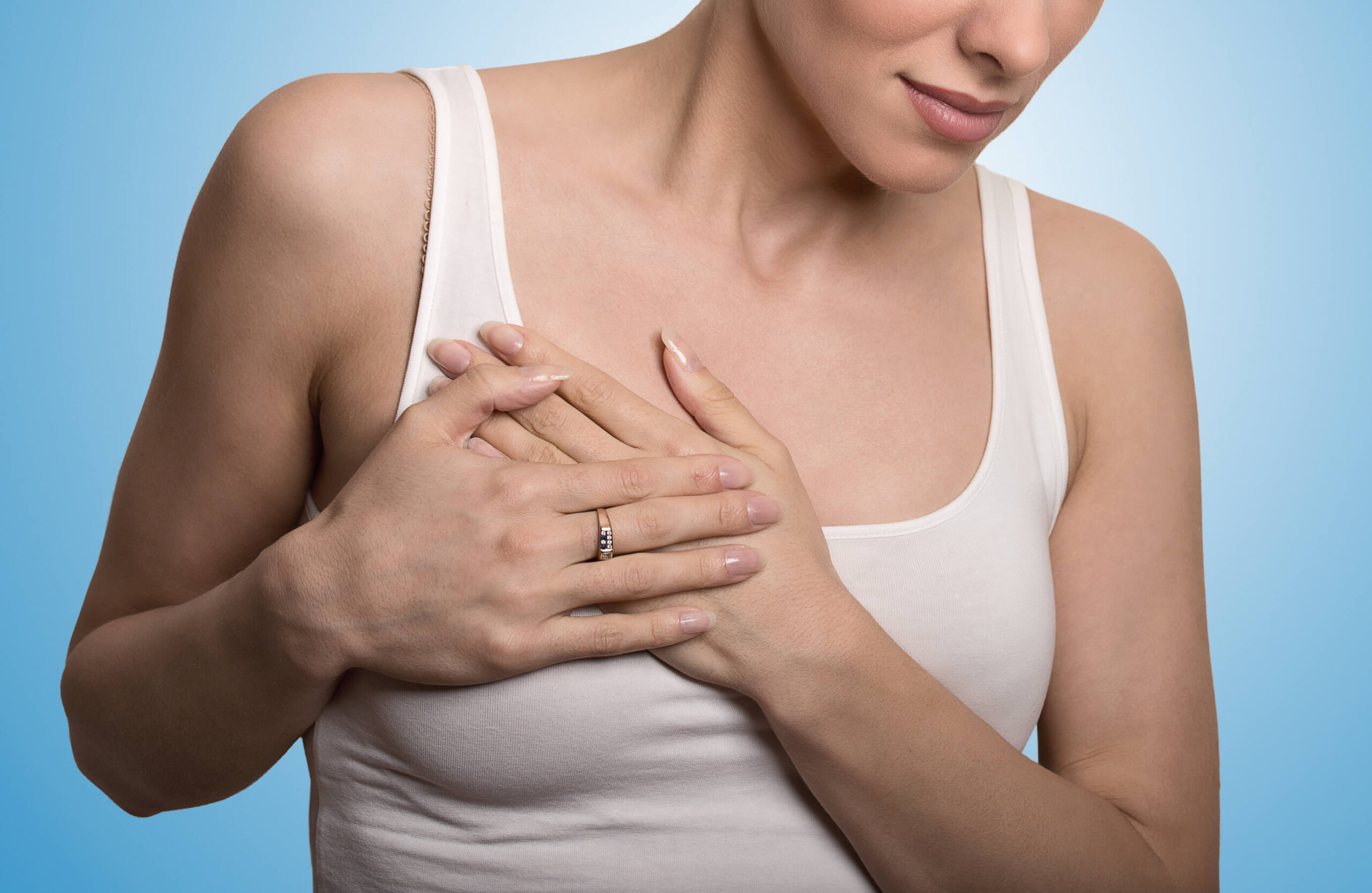 A visual comparison of breast implant surgery and fat transfer performed by Dr. George Brennan, a plastic surgeon located in Orange County, California.